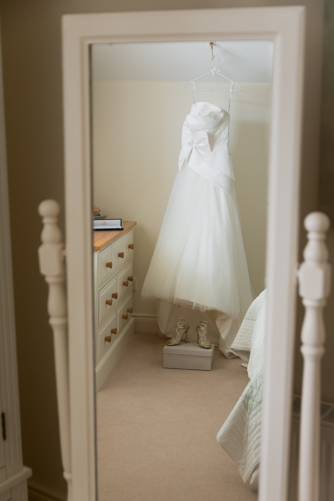 Clare Wedding Photographer | Wedding Dress hanging in bedroom